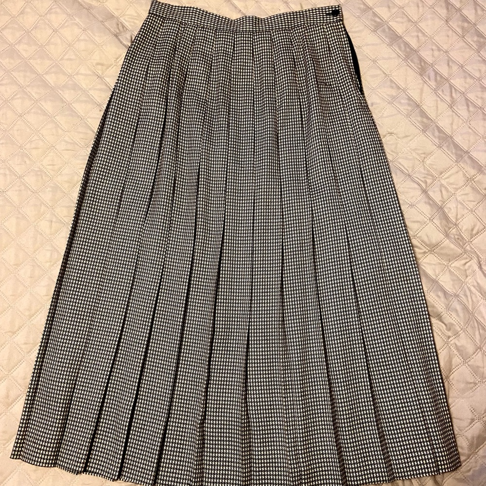 Black and white checkered skirt.  Excellent condition. Very versatile.